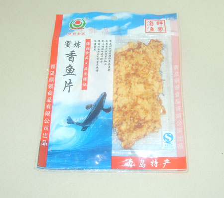 蜜炼香鱼片 青岛食品;青岛食品;青岛食品;烧烤鱿鱼;烧烤黄花鱼;鱿鱼丝;绿岭食品;青岛绿岭;烤鳕鱼;鳕鱼丝;辣烤鳕鱼;烤虾皮; 绿岭--青岛绿领食品有限公司