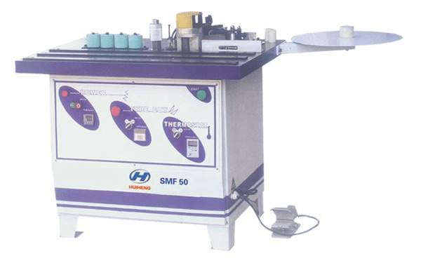 SMF50双面涂胶封边机 木工机械;半自动封边机;全自动封边机;双面涂胶封边机;精密推台锯;全自动后成形包边机;板式家具组合机;真空覆膜机;双工位真空覆膜机; 封边机--青岛汇恒木工机械有限公司